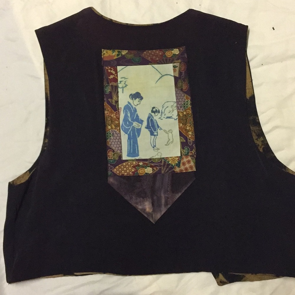 Wearable art reversible vest